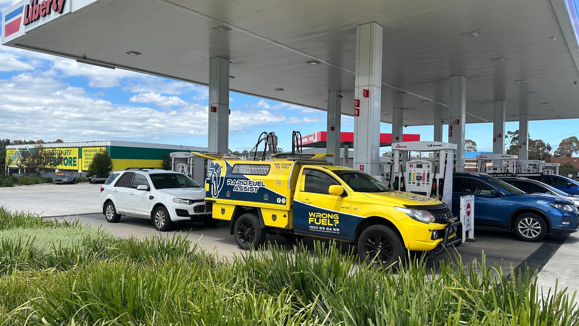 Rapid Fuel Assist service ute at a petrol station in Ferntree Gully, Melbourne