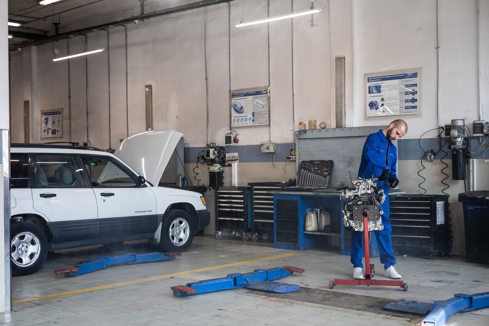 Mechanic working in a car service workshop